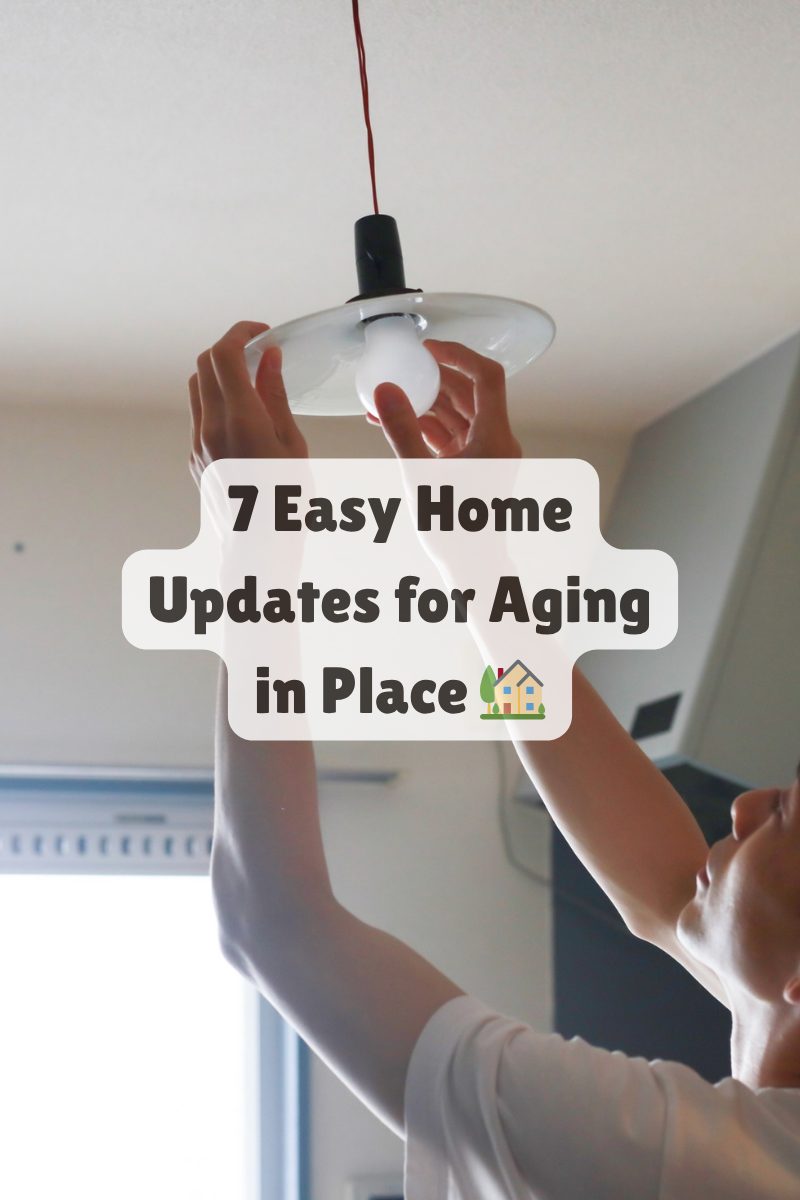 Person changing a light bulb in a bright home, symbolizing simple home improvements for safe aging in place.