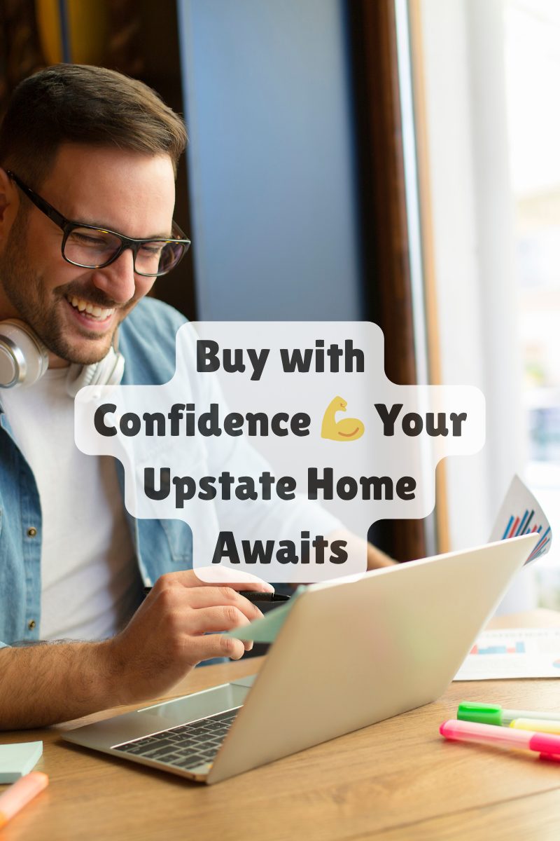 Smiling man using laptop and credit card at a café, symbolizing confident home buying in Upstate South Carolina.