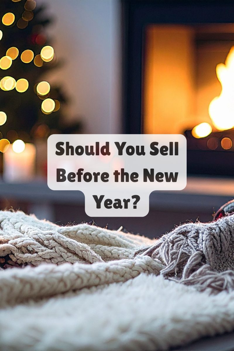 Cozy living room with a fireplace and holiday lights, representing year-end real estate planning in Upstate South Carolina.