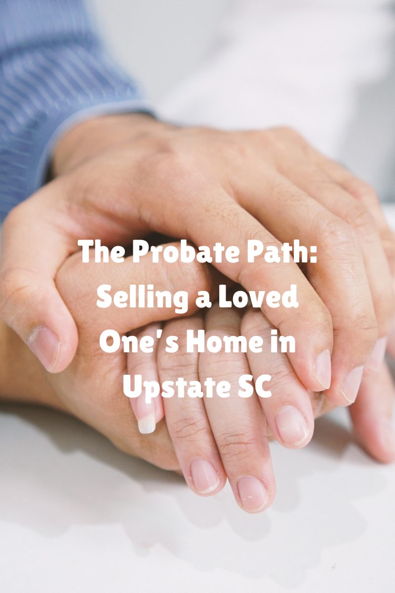 Close-up of two people holding hands, symbolizing compassion and support during the probate home sale process in Upstate South Carolina.